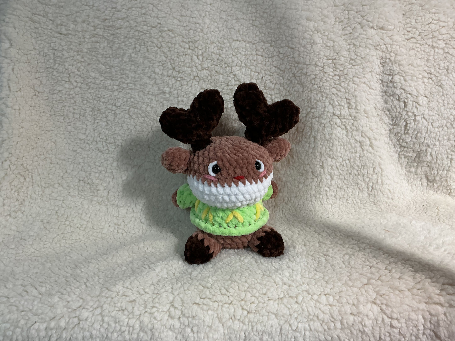 Cute Little Reindeer in a sweater